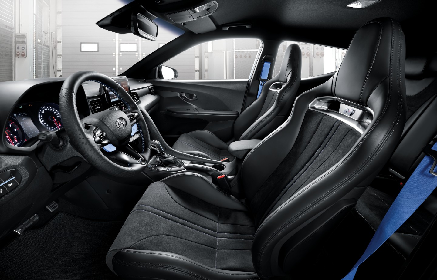 Lightweight bucket seats covered in Alcantara are a neat new option