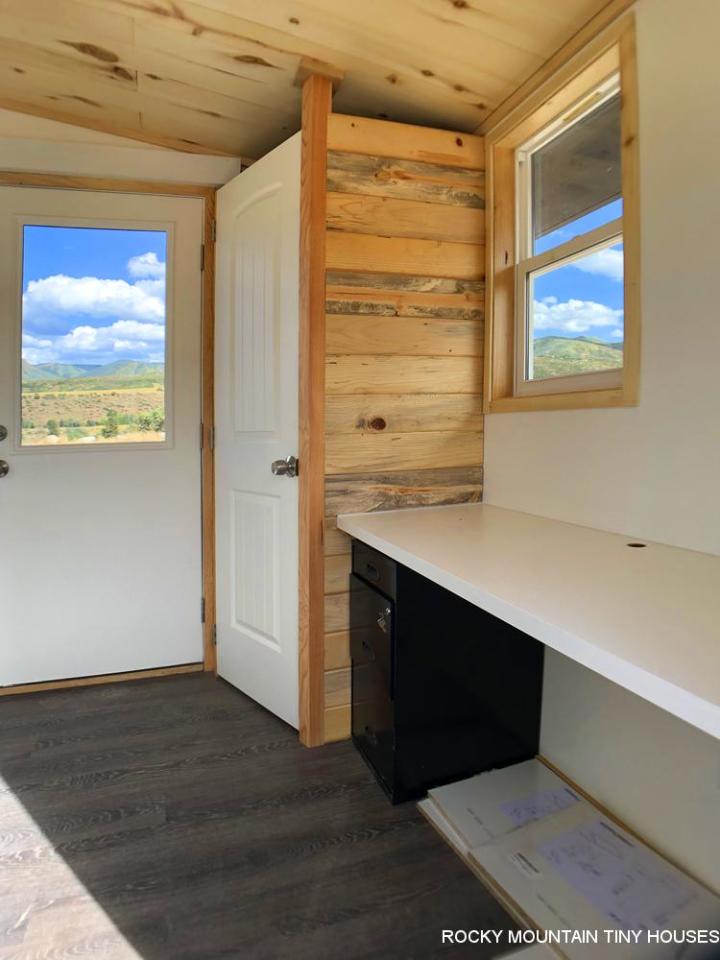 The City of Aspen Carpool Kiosk includes a desk area and a small bathroom with toilet and storage space (not pictured)