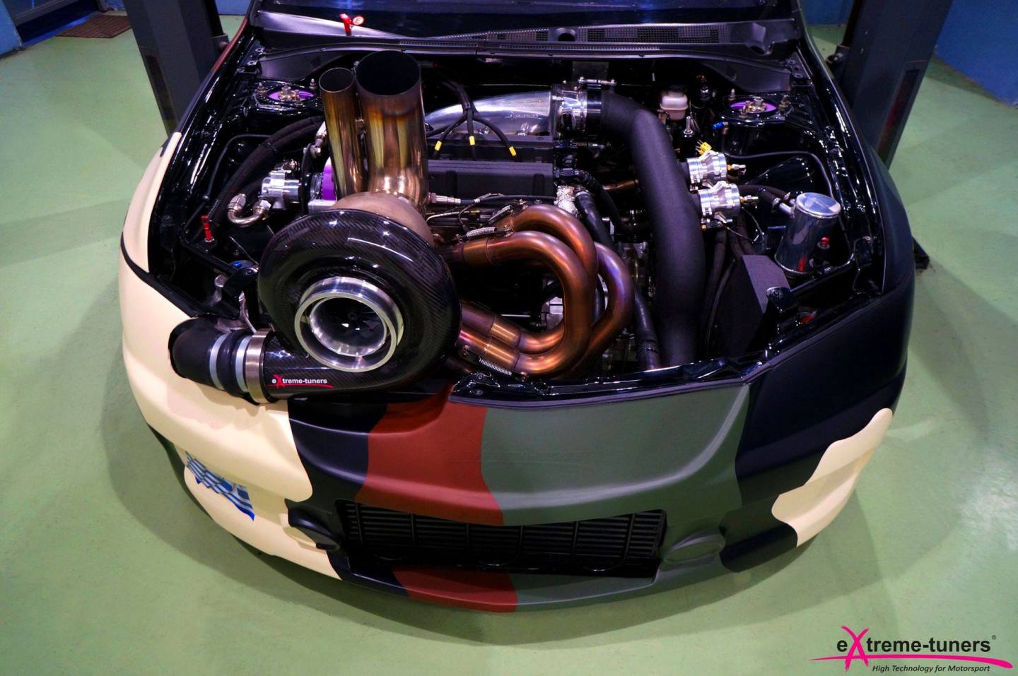 That's a decent sized turbo, eh? This Mitsubishi Evo now makes upwards of 2,800 horsepower for drag racing