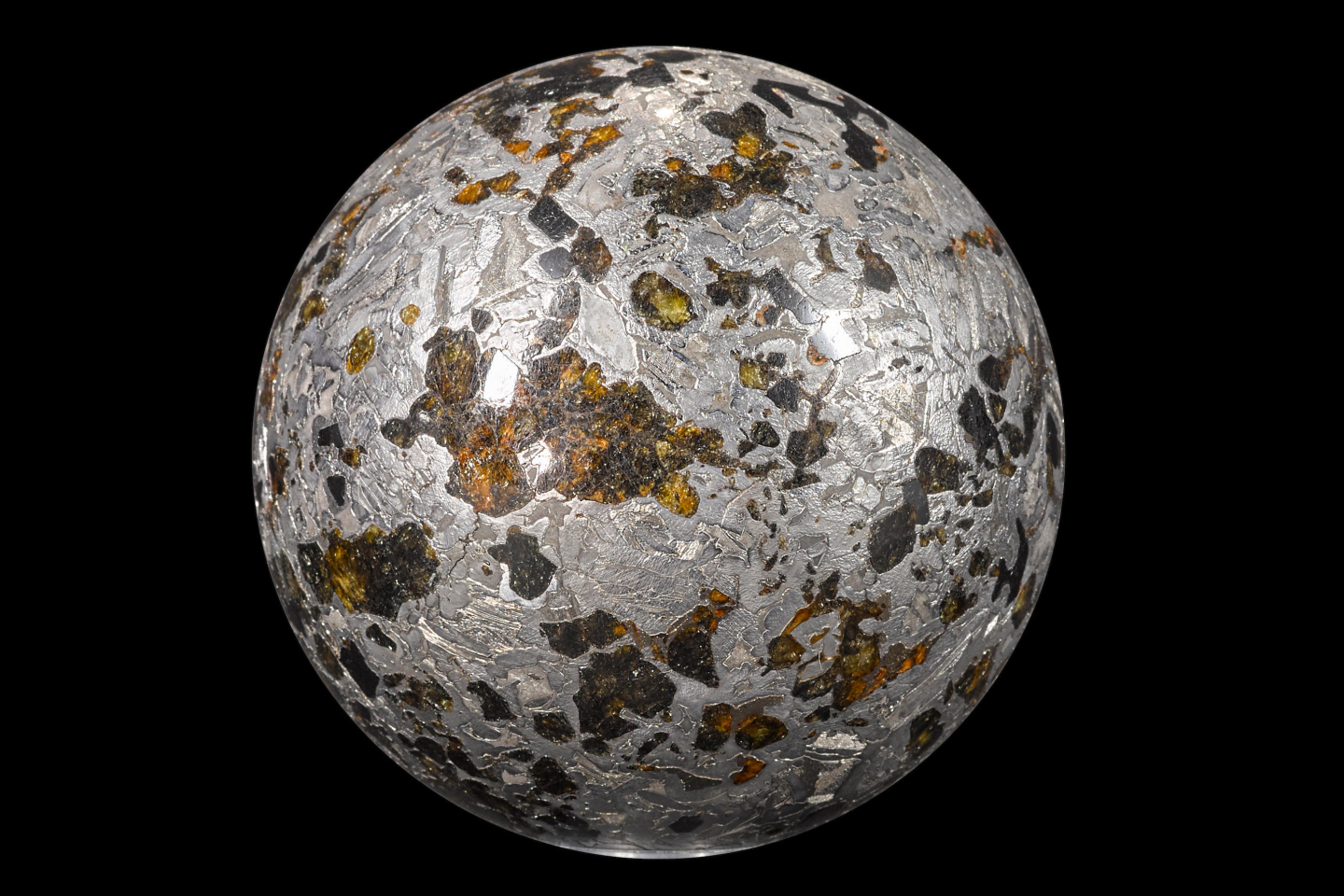 Weighing 7.53 lbs (3.417 kg), this 4 inch (10 cm) diameter sphere was cut from a Seymchan meteorite found in Russia in 1967.