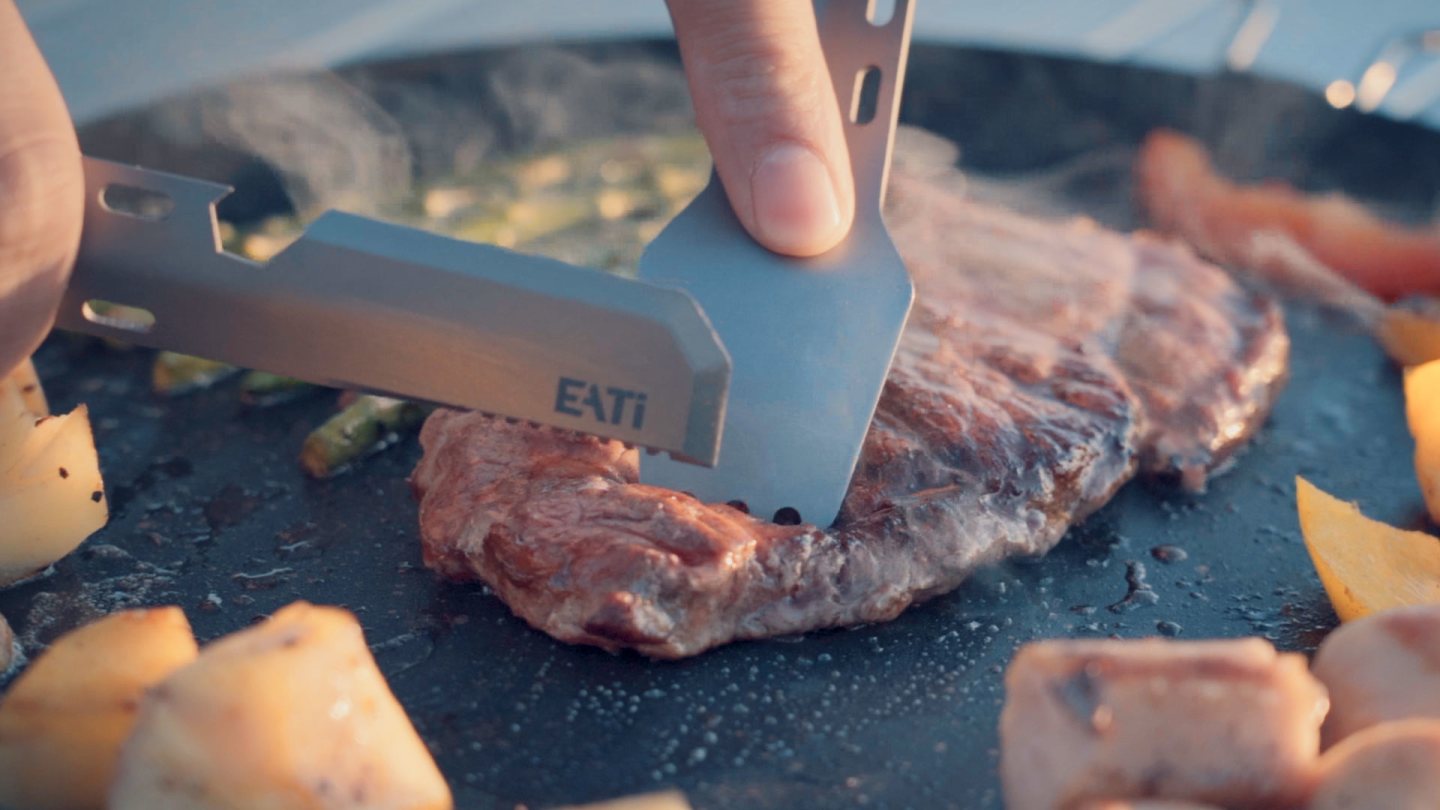 The serrated knife works to cut steak, crusty bread and other food that doesn't cut easily with the straight blade