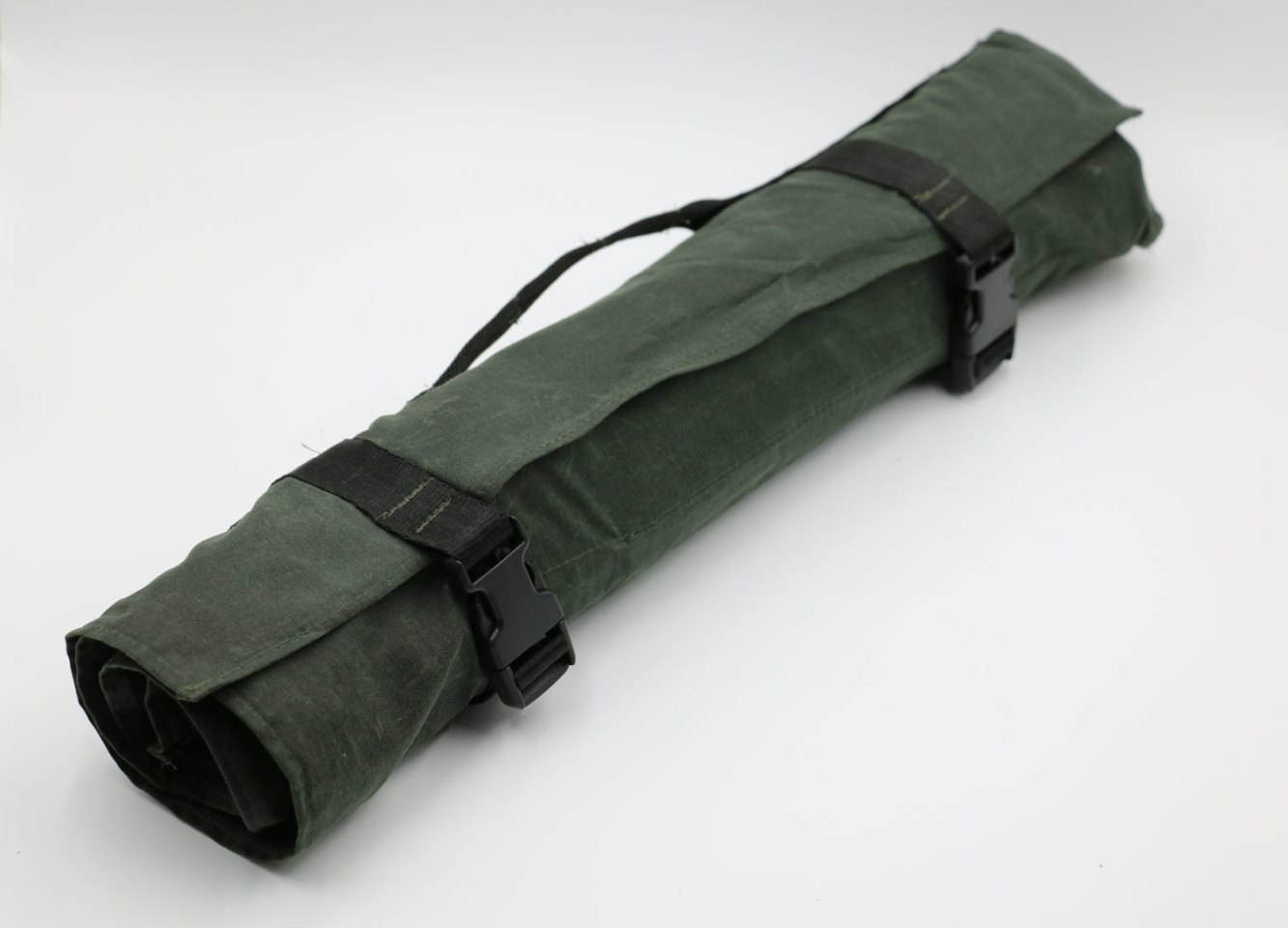 The included roll packs everything into easy carry/store form