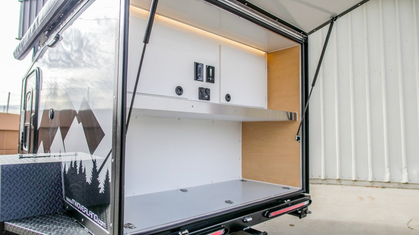 In place of slide-outs and kitchen equipment, the AT packs an empty galley designed for the owner to build out or fill up