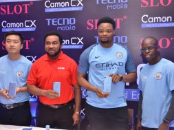 Photo release shows Nnamdi Ezeigbo, Managing Director & CEO, SLOT of Nigeria, second from left, when Teno, official partner of Manchester City Football Club, held a press conference with Nigerian mobile phone retail chain outlet, SLOT, announcing the exclusive sales of the Camon CX Manchester City Limited Edition at all SLOT outlets in Nigeria.