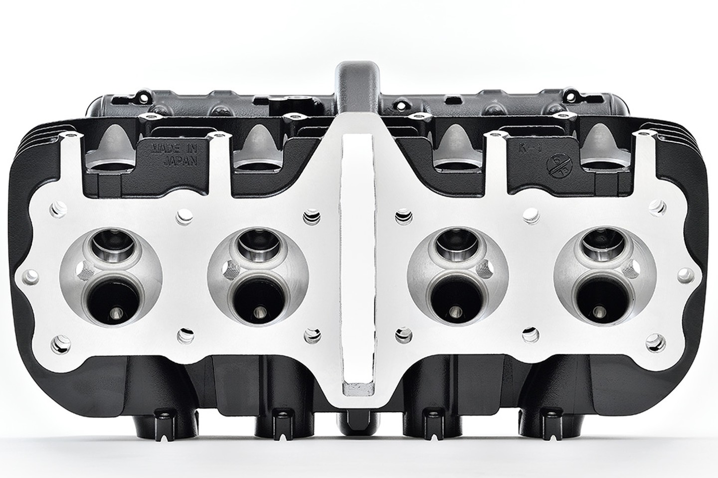 Kawasaki’s reproduction Z1 cylinder heads will sell for US$2370, including camshaft brackets, tappers, valves and peripheral parts, but not including camshafts, cylinder head cover, gaskets, etc. The heads feature the M8 exhaust-pipe-attachment stud bolt dimensions from later Z1 models, and do not fit the second-generation Kawasaki KZ1000 MKII and other so-called "square head" models.
