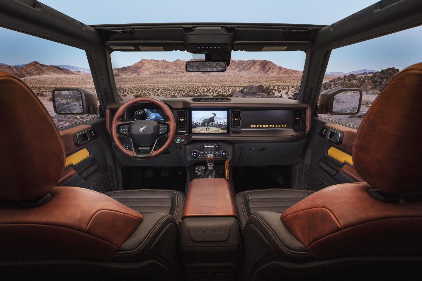 The 2021 Bronco will offer an available 12-inch SYNC 4 system, optional leather trim seating, console-mounted transmission shifter/selector and G.O.A.T. Modes control knob