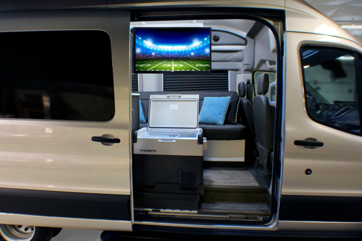 Swing the fridge and TV around, and you have a game day tailgate area or movie night nook