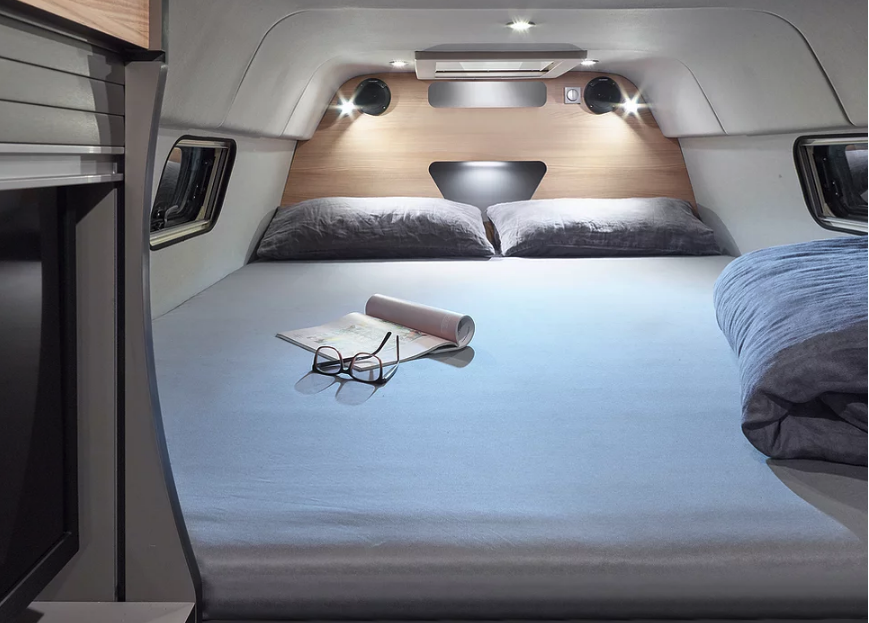More than just a bed in the rear, the Alphavan's master suite is a cozy sleeping nook closed off from the van with a rear wall