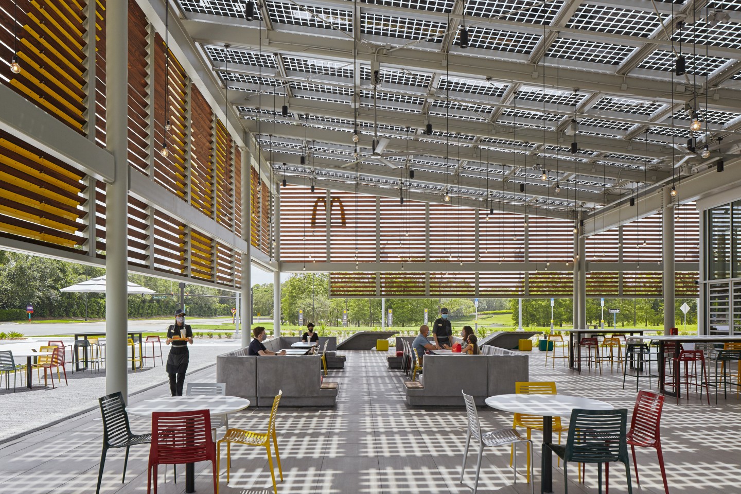 McDonald's Disney World includes a large semi-outdoor dining space