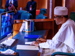 President Muhammadu Buhari seen in picture on desktop computer