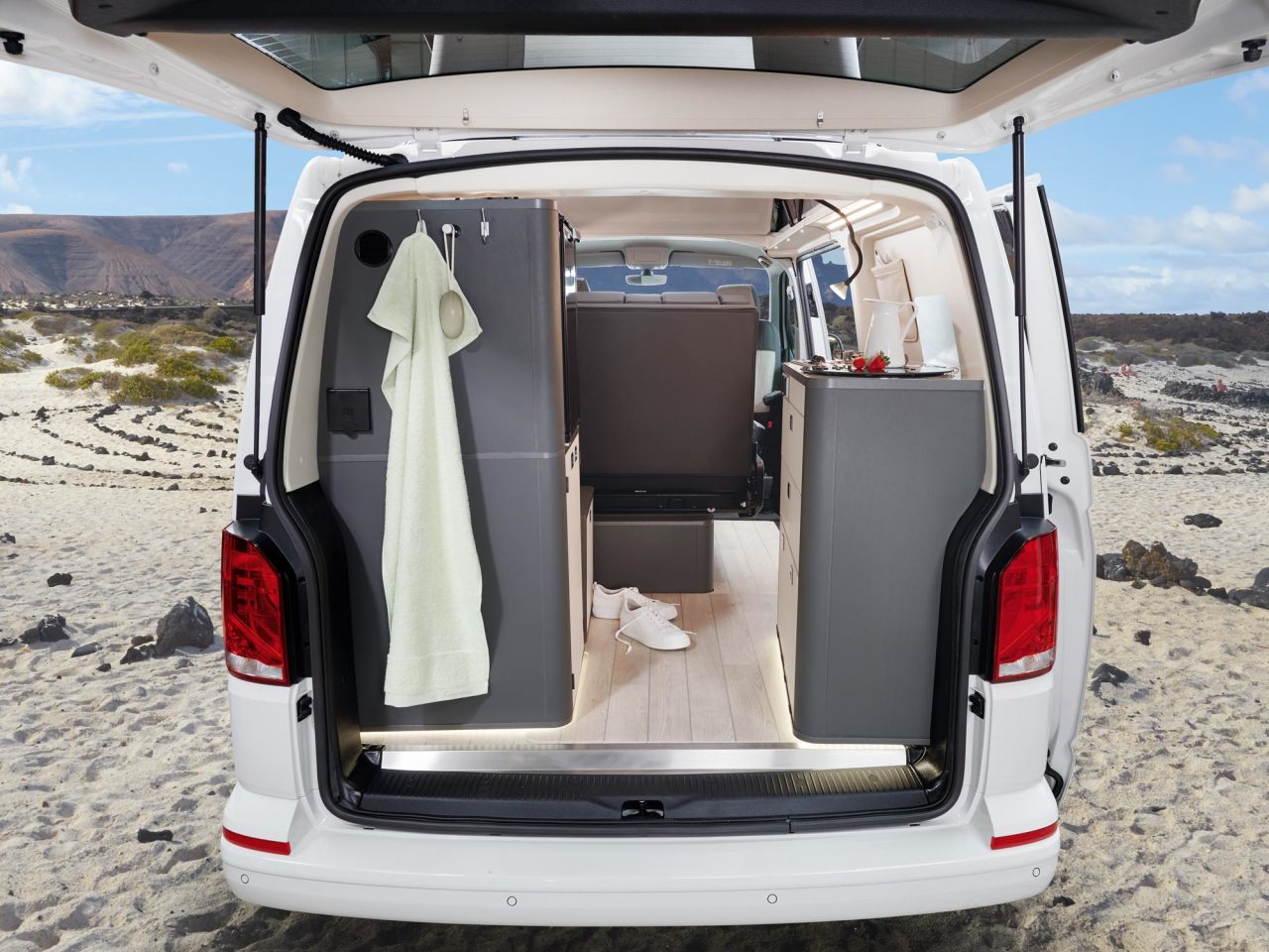 The Westfalia Kepler Five has an outdoor shower with convenient towel hanging and optional hot water