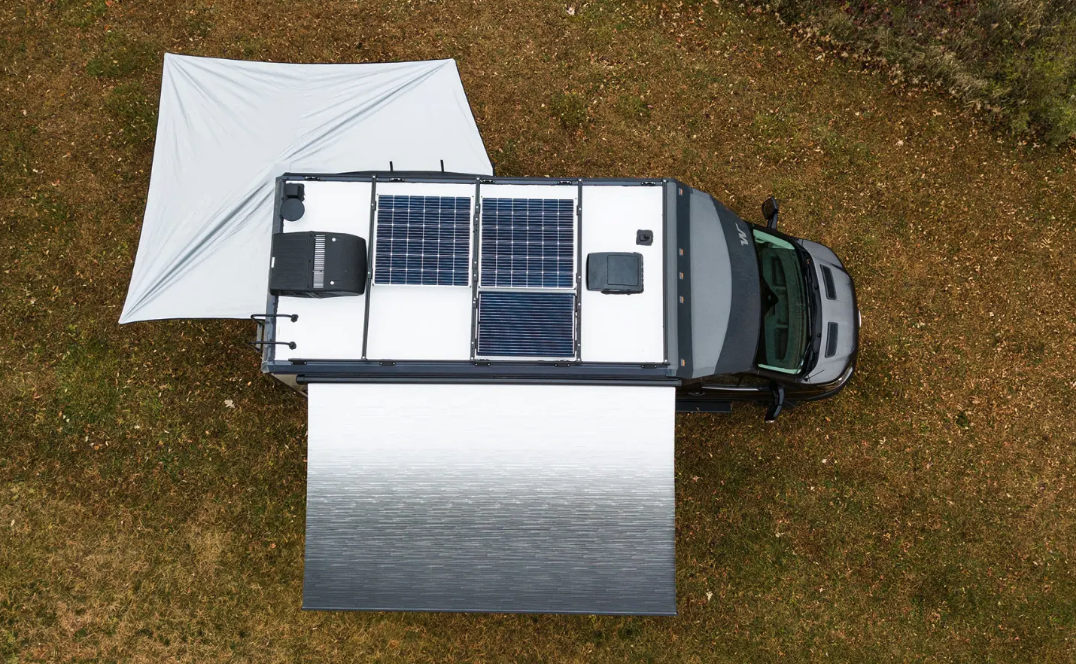 The view from above shows the dual-awning team and roof-mounted solar panels