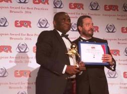 Tony Ojobo, Director Public Affairs receiving the award on behalf of the Commission