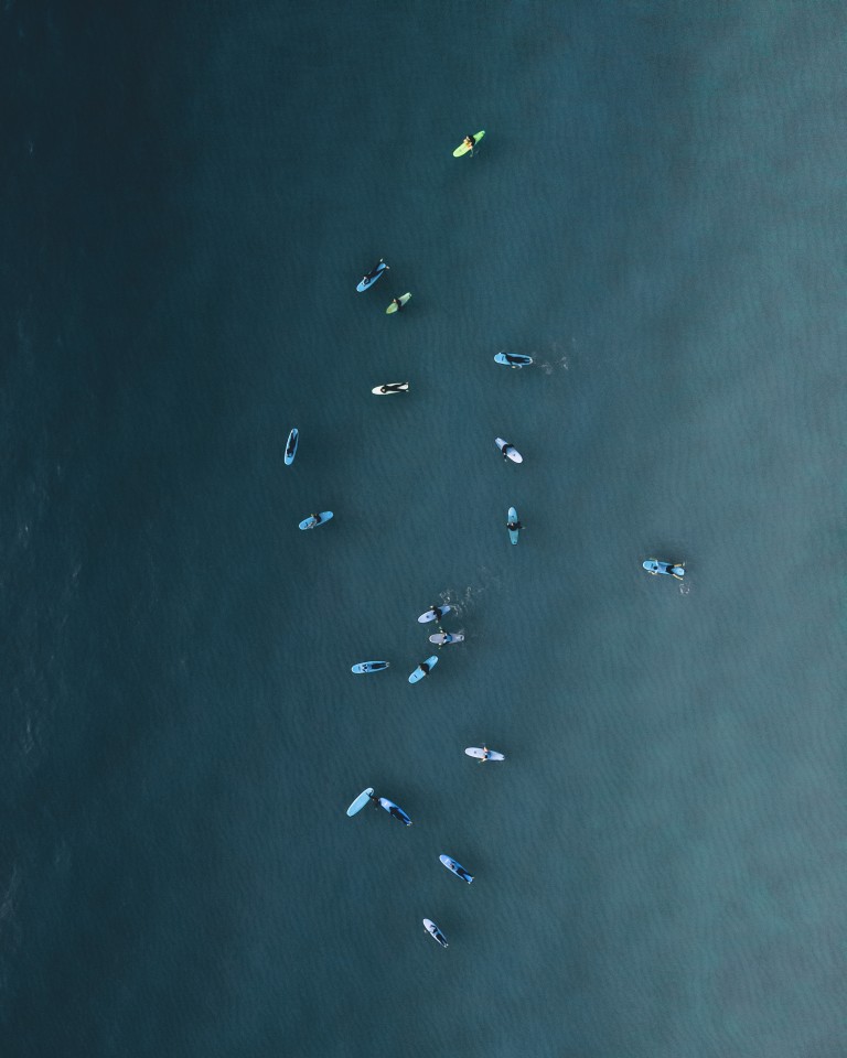 'Tiny surfers paddling from above always reminds me of tiny fishes'. Gironde, France