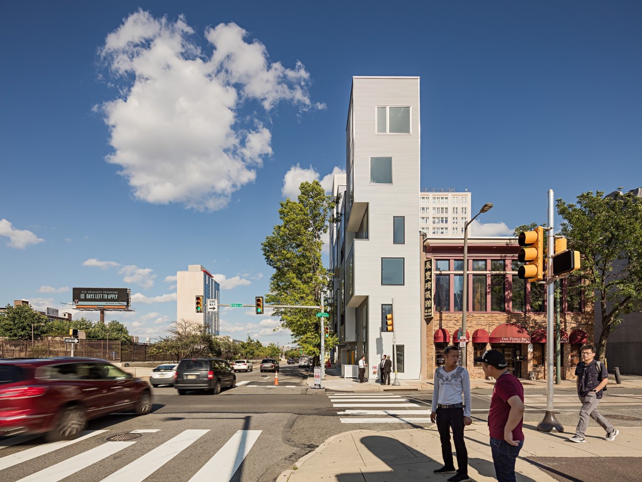 XS House was designed by Interface Studio Architects and fits a modern housing project into a cramped plot in Philadelphia