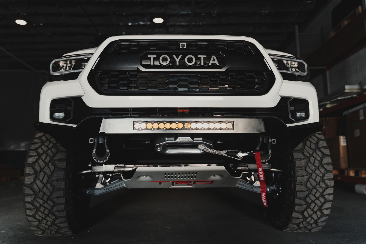 In addition to bolting its high-tech camper to the Tacoma, TruckHouse adds some improvements to the truck's mechanicals, including a long-travel front suspension