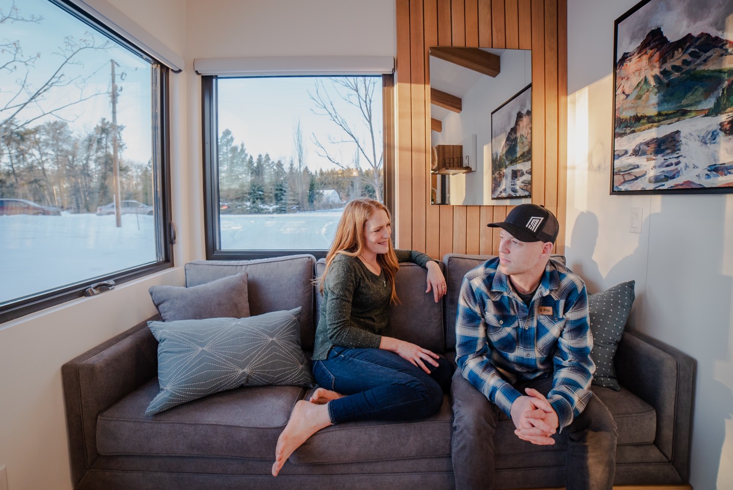 Heather and Kevin Fritz relax inside their tiny house