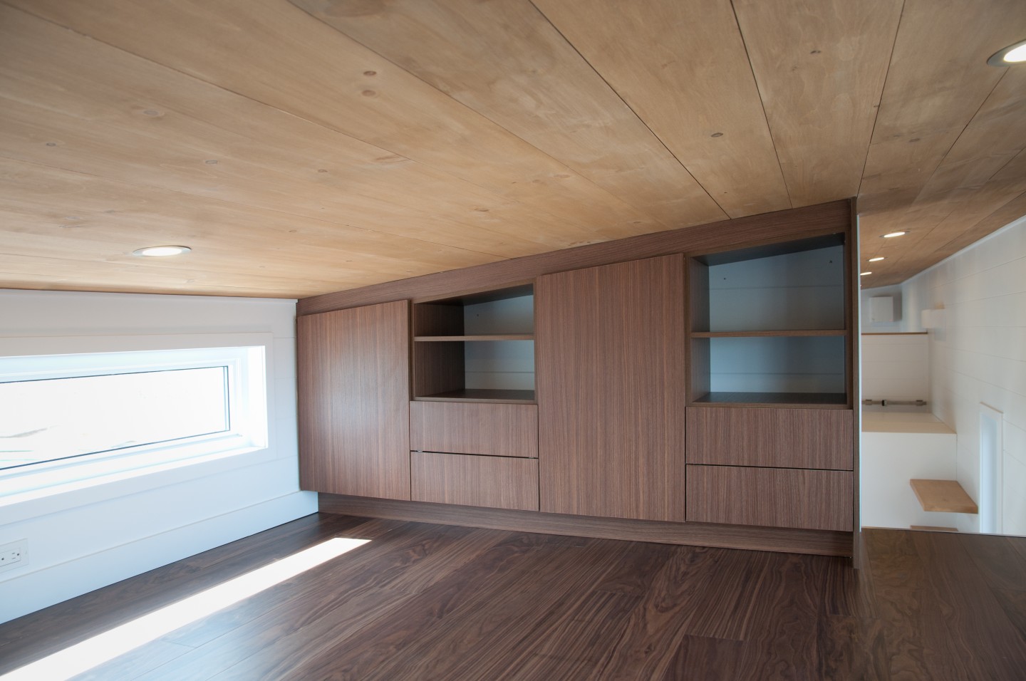 The Ébène V4's master bedroom features integrated storage space