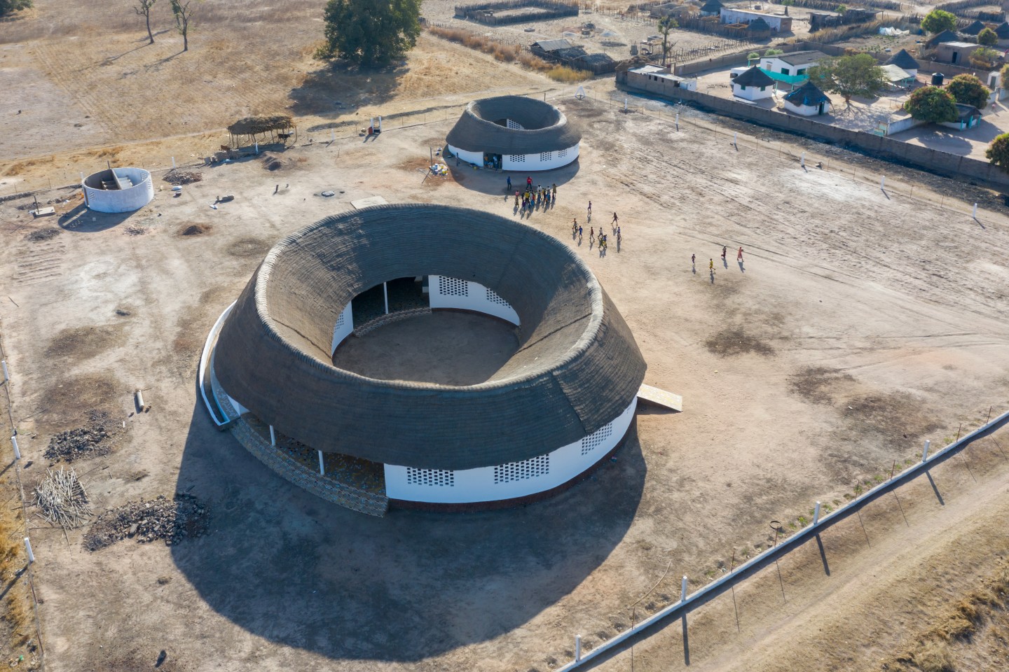 Fass School and Teachers' Residences was made using local sustainable materials like mud bricks, thatch, and bamboo