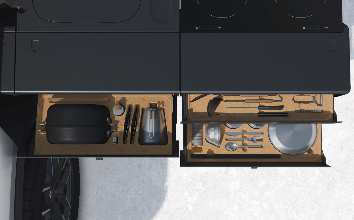 For a limited time, the slide-out kitchen comes stocked with a Snow Peak kitchen set as standard