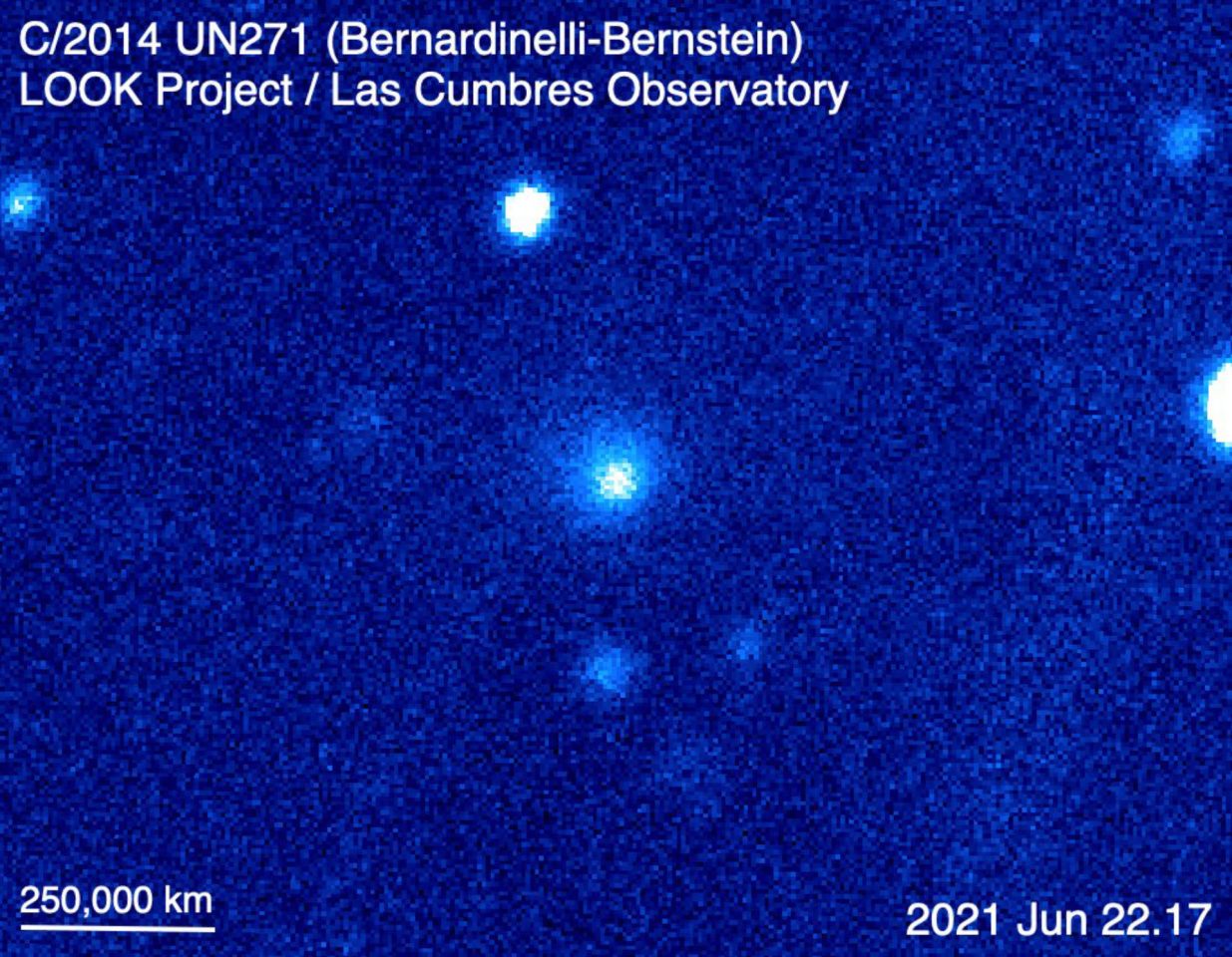 Comet C/2014 UN271 Bernardinelli-Bernstein (center), with the coma visible as a fuzzy cloud around the bright spot, in contrast with stars such as the one at the top, which have a crisp outline