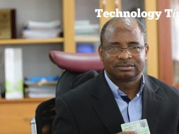 Engineer Aliyu Abubakar Aziz, Director General/CEO of National Identity Management Commission (NIMC), seen holding a National ID card during the interview with Technology Times at the NIMC Headquarters in Abuja