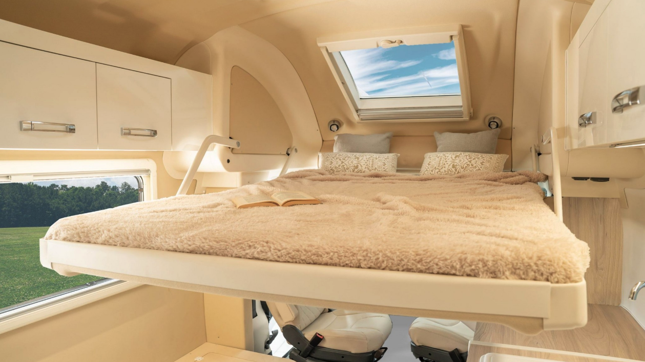 The bed includes a skylight overhead