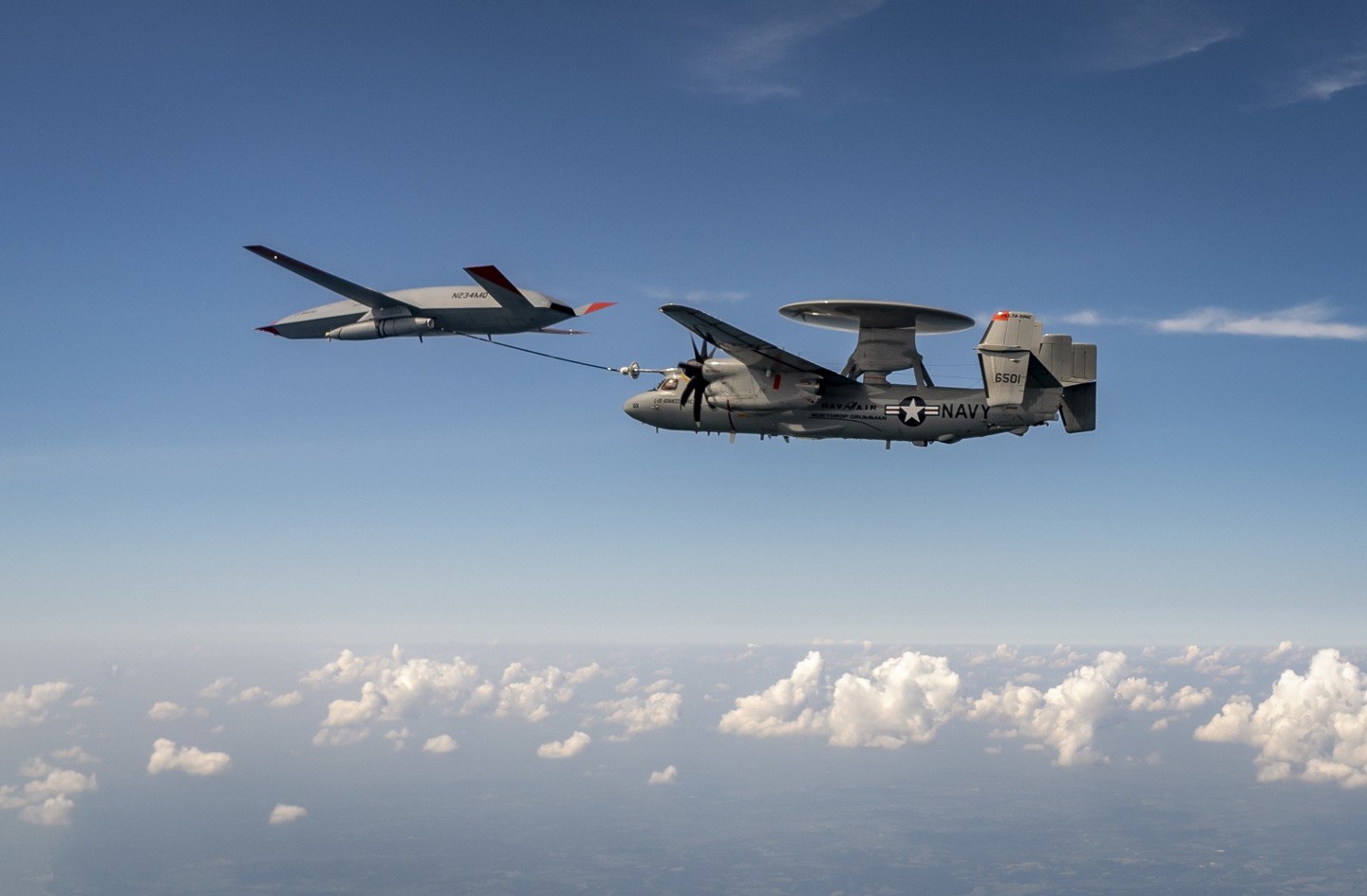 The flight test studied how the Hawkeye handled the Stingray's engine wake