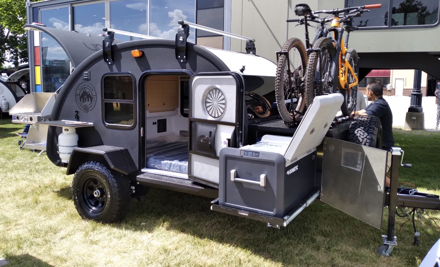 Bean shows the Black Bean teardrop trailer at the 2021 Outside Adventure Expo in Salt Lake City