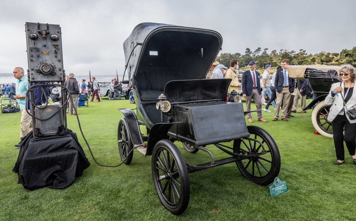 At left is the home charger and at right is the electric car it charged: a 1901 Columbia Mark XXXI Victoria Phaeton. The car is owned by Nick Grewal of Sanbornton, New Hampshire