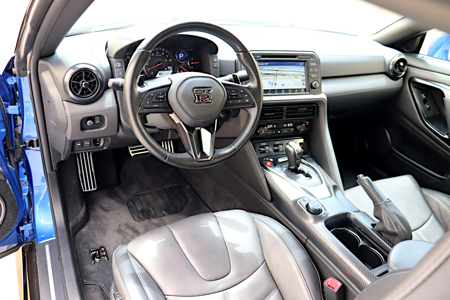 The cabin of the Nissan GT-R is all aimed at the driver and was considered pretty luxurious when this car debuted 12 years ago