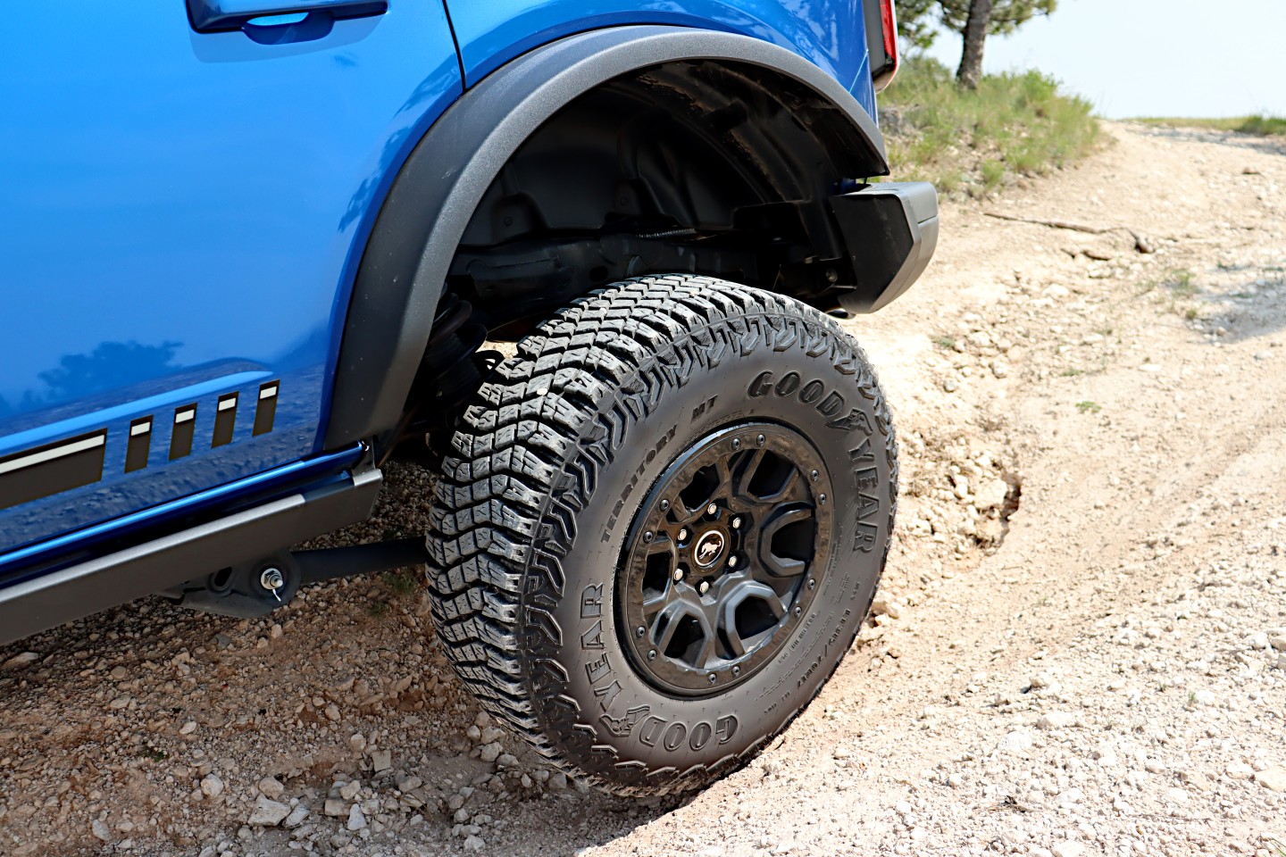 The tire here is only a few millimeters off the ground, but this was the deepest hole we could find to demonstrate the Bronco's articulation