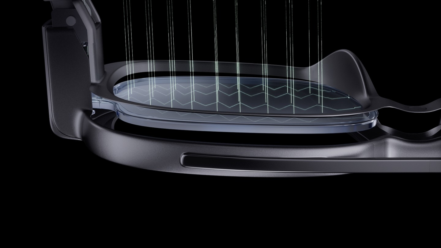 Light from the MicroLED is routed to the wearer's eye via optical waveguides on the lens