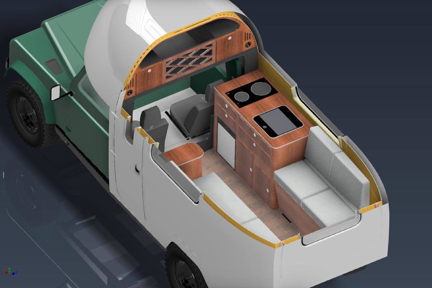An initial interior rendering shows a layout with rear dining lounge/convertible bed, kitchen block and alcove storage area