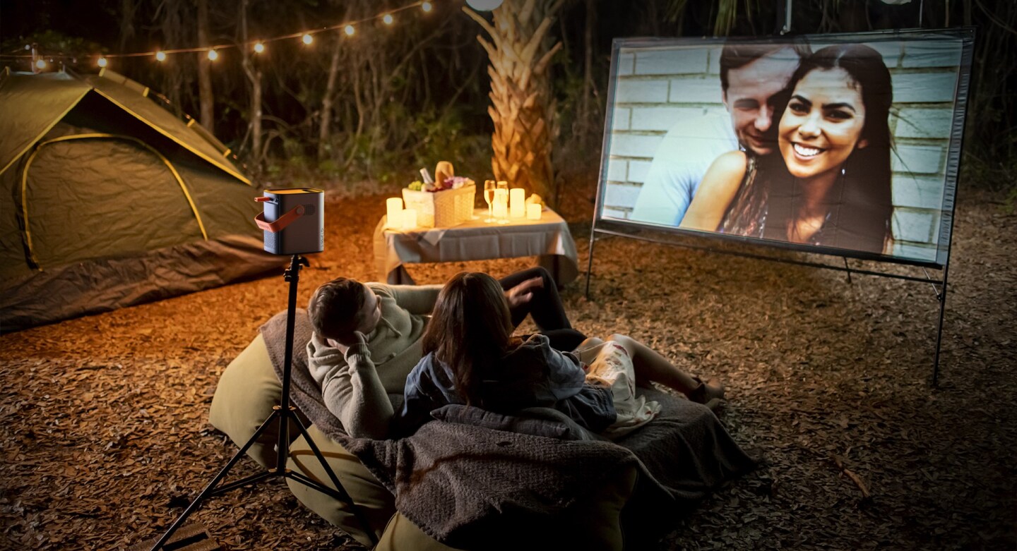 Though shown here at camp, the CUBE4 will need to be connected to a power outlet before outdoor movie night can begin