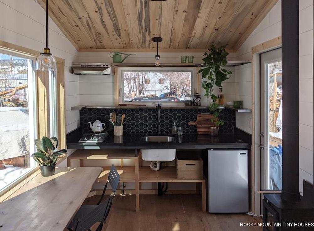 The Boulder 2.5 has a basic kitchenette that includes a fridge, sink, and two-burner propane-powered stove