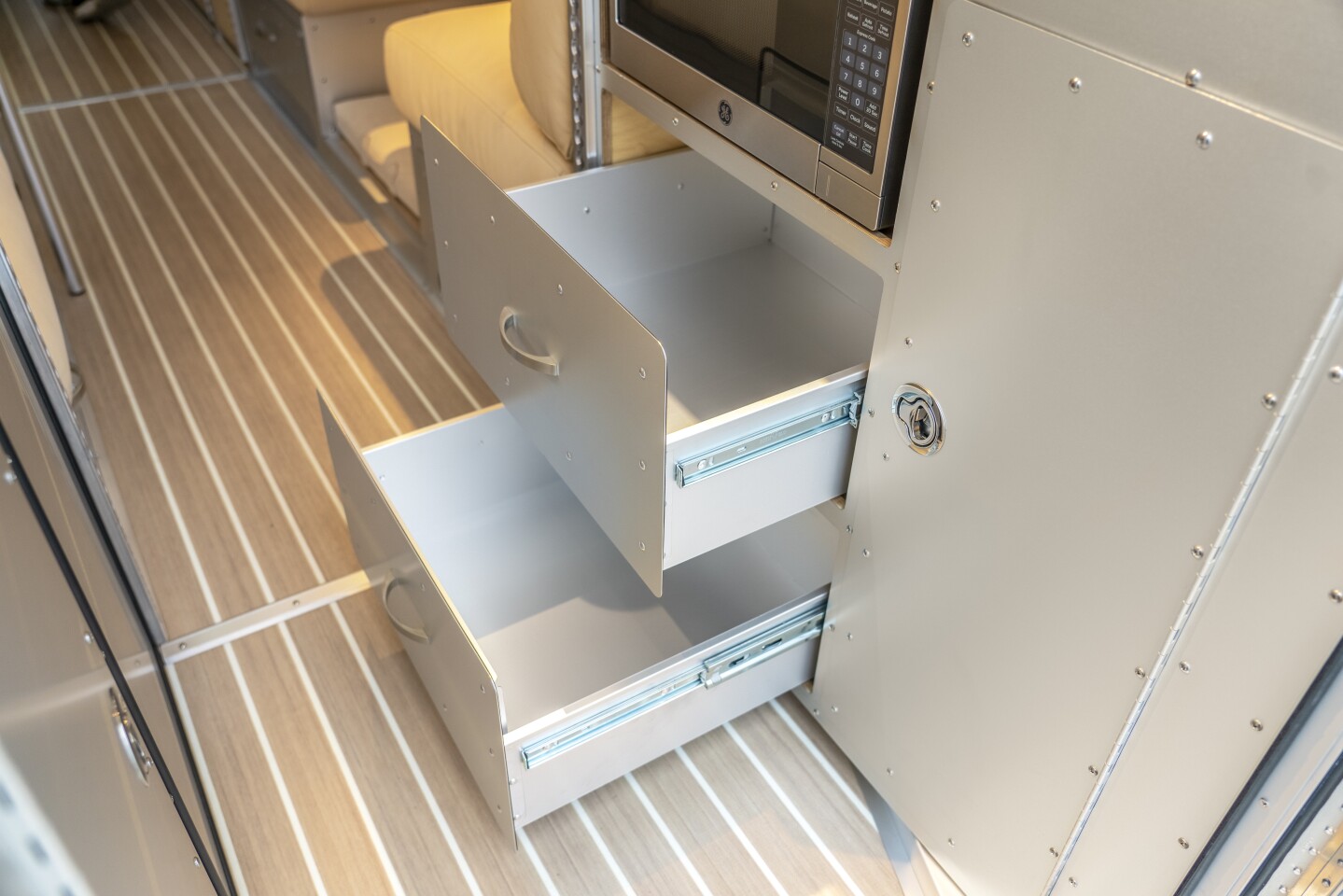 The kitchen welcomes larger drawers for improved storage