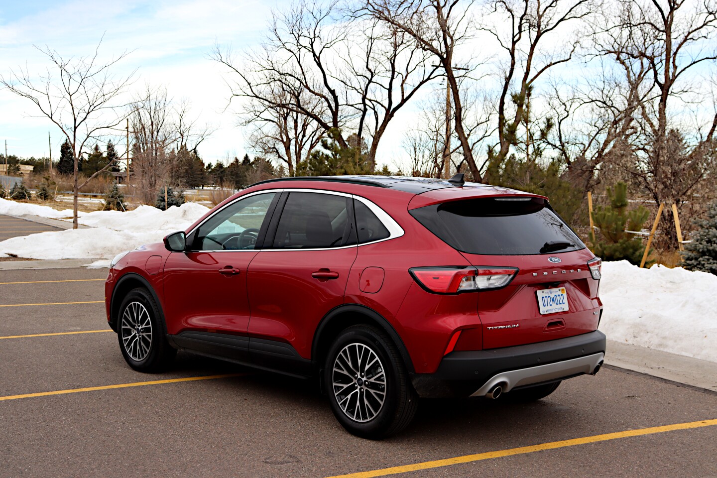 Both the charging port and the fuel port are on the left side of the Escape PHEV, making it easy to remember where to fill