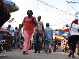 people_walking_by_in_ikeja_computer_village