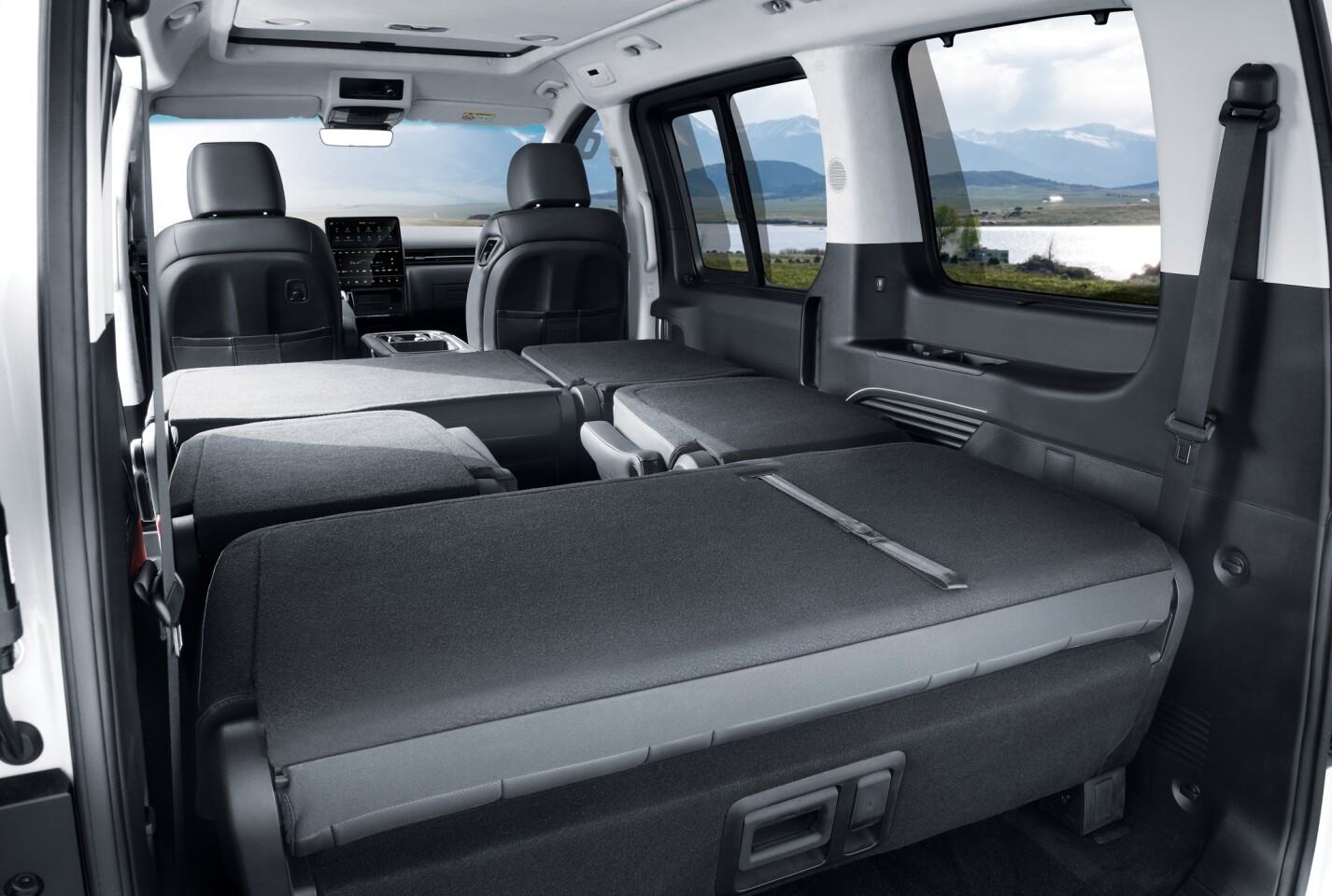 The Camper 11 lacks the kitchen and dining amenities of the Camper 4 but seats a total of 11 people and sleeps four on its fold-down seats and pop-up roof bed