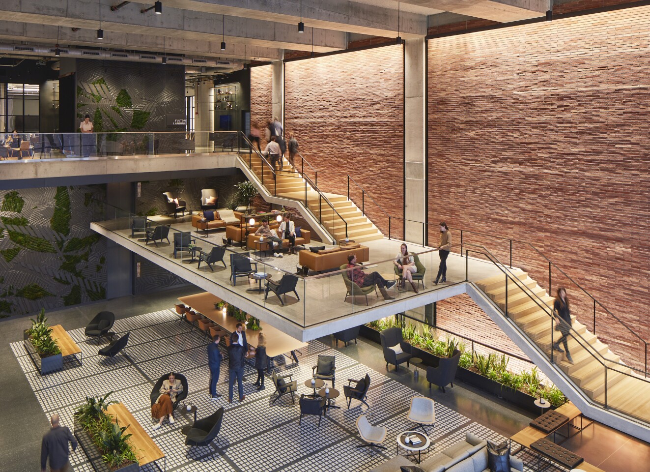 800 Fulton Market's entrance hosts a triple-height lobby with an eye-catching cantilevered staircase and mezzanine area