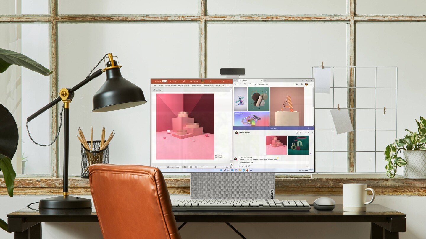 The Yoga AIO 7 desktop's narrow-bezel 4K display can be rotated from landscape to portrait mode for TikTok-friendly viewing