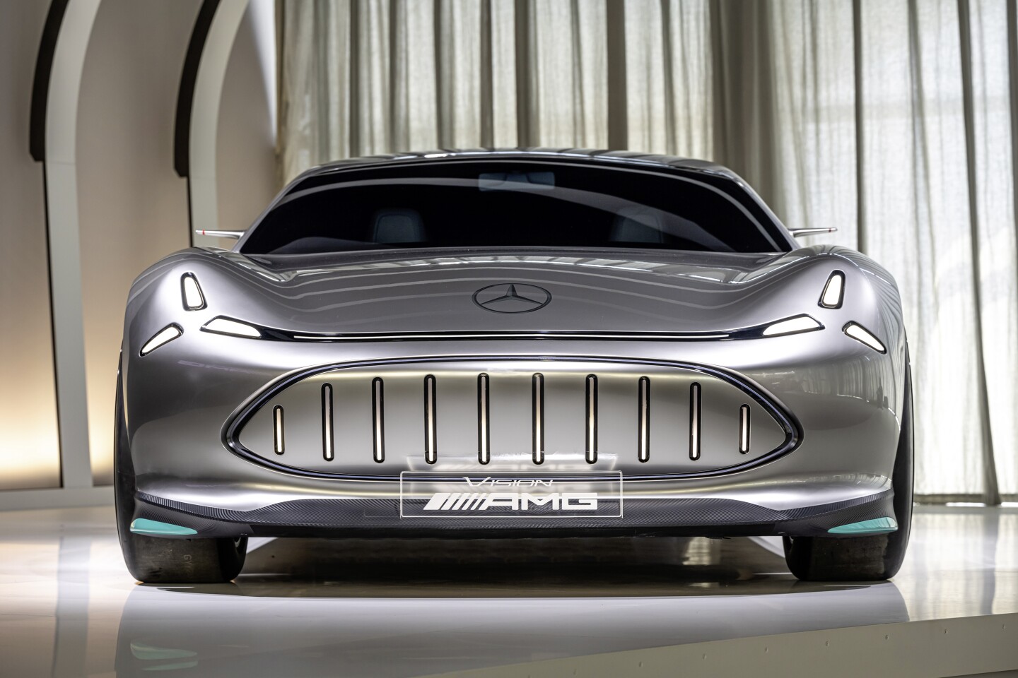 The sleek, compact headlamps and unnecessarily large, aggressive grille read like a major mismatch to our eyes