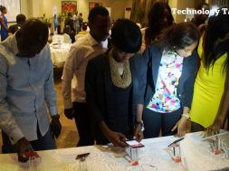 People seen testing mobile phones at an event in Lagos