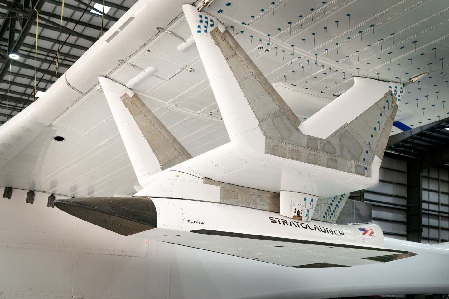 The TA-0, attached to the pylon which will both carry and release it