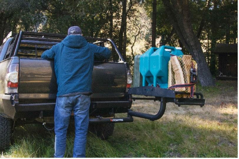 Introduced at Overland Expo West 2022 alongside the Hitch Kitchen, the new HitchFire Ledge is a swing-out hitch rack, particularly good for carrying large, awkwardly sized items