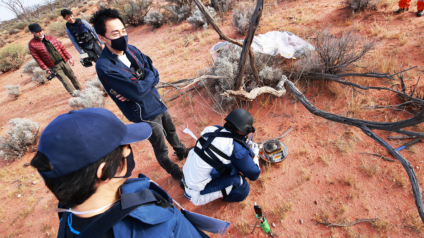 Researchers gather in outback Australia to collect the sample return capsule dropped off by Hayabusa2 in December 2020