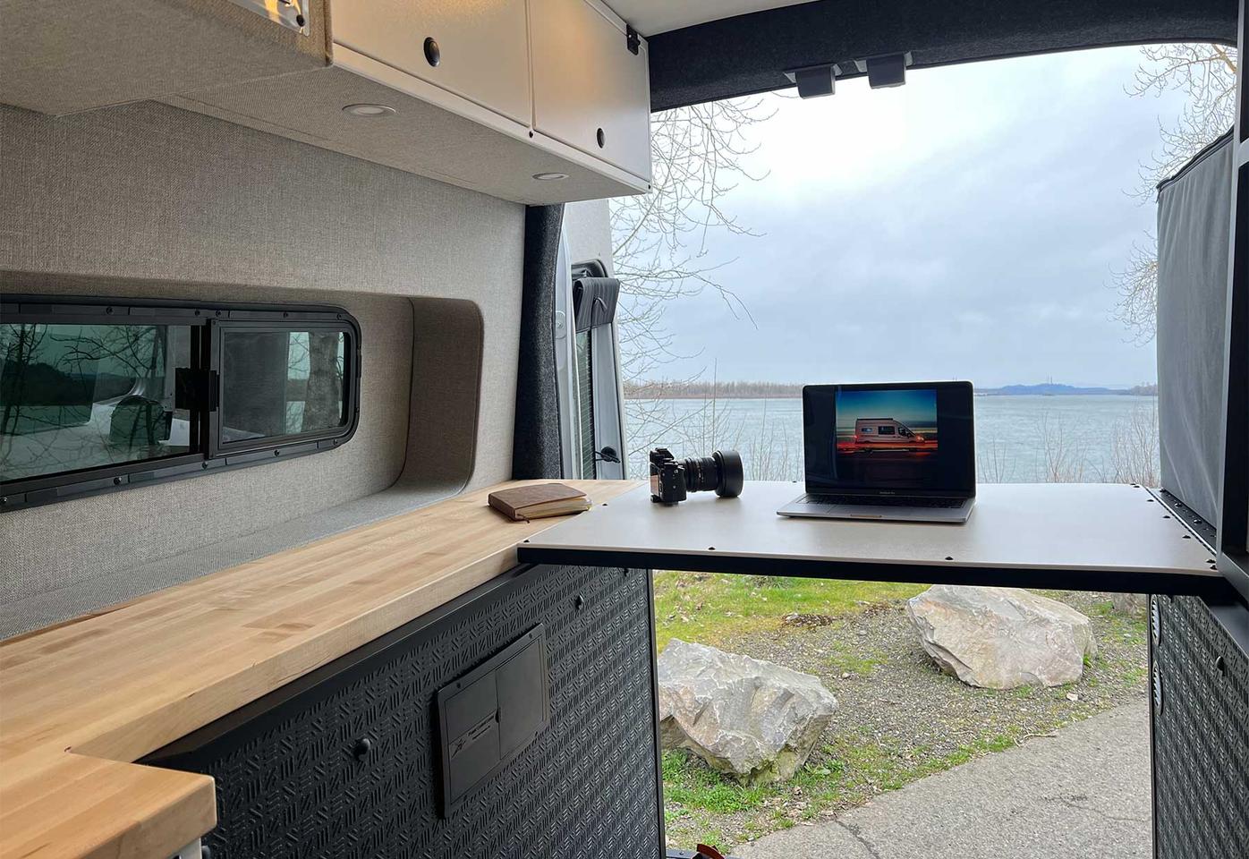 Pull a chair up, and Grit's fold-down table becomes a scenic place to do a little laptop work