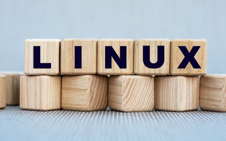 LINUX - word on wooden cubes on a beautiful gray background