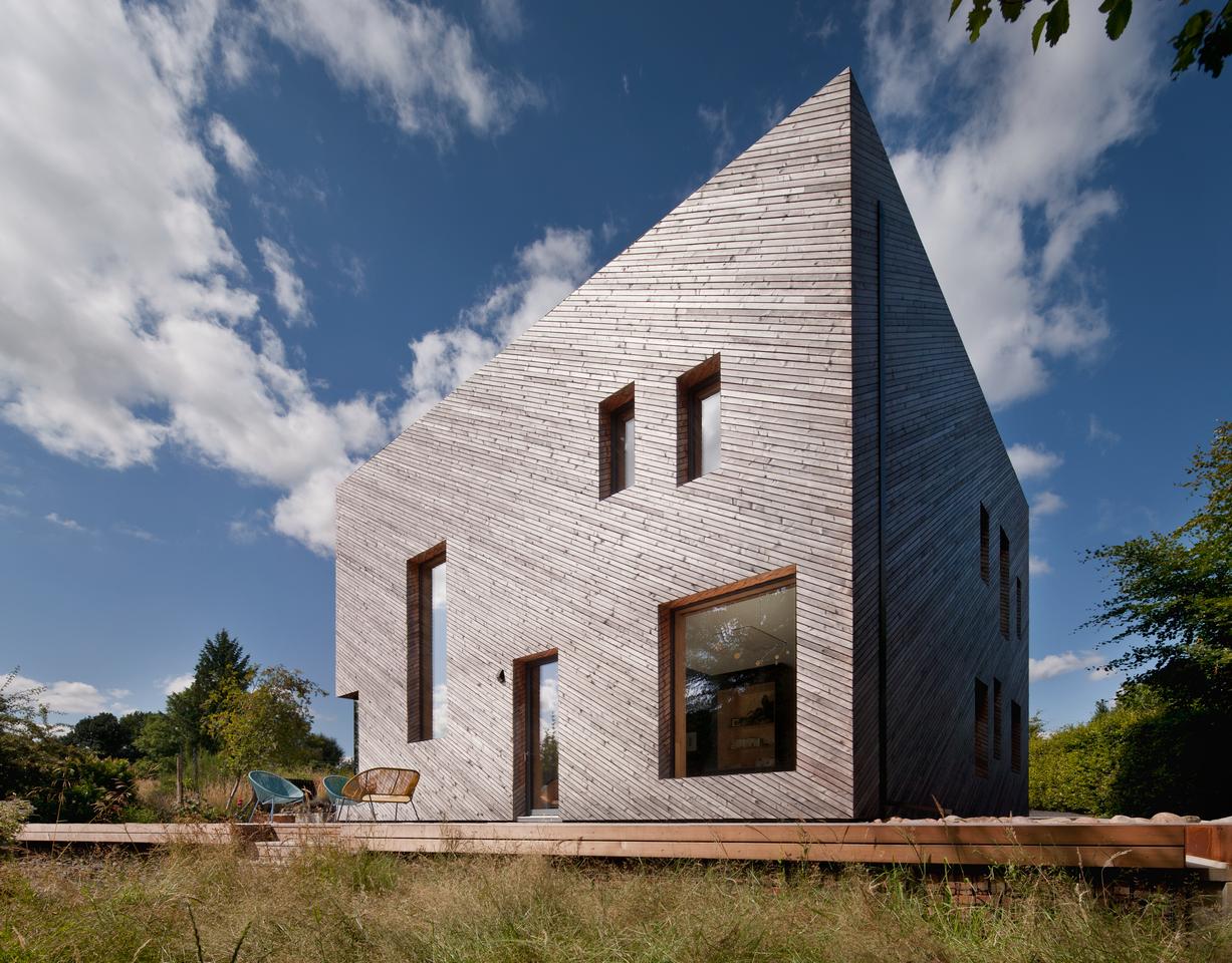 Ostro Passivhaus was designed by Paper Igloo and is located in Scotland. The light-filled sustainable home was a labor of love created over eight years of evenings and weekends by the architect owners